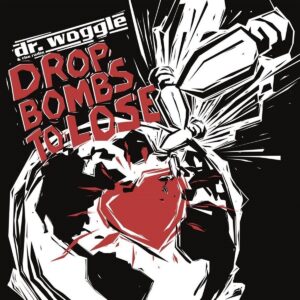 Dr. Woggle & The Radio – Drop Bombs To Lose
